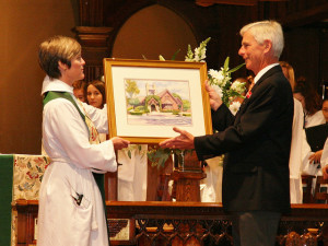 Outgoing Senior Warden, Chip Nichols is presented with a gift from the parish: a beautiful watercolor by parishioner and artist Jim Dow.