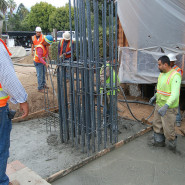 Concrete, Steel Cages Installed Deep Under New Tower Location